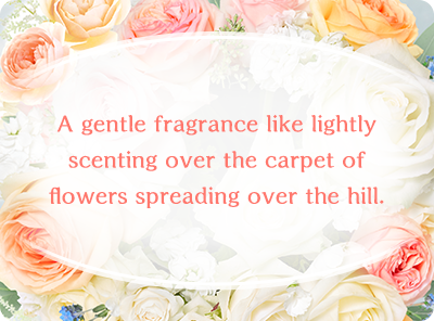 A gentle fragrance like lightly scenting over the carpet of flowers spreading over the hill.