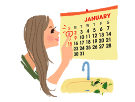 カレンダーで生理周期を確認する女性